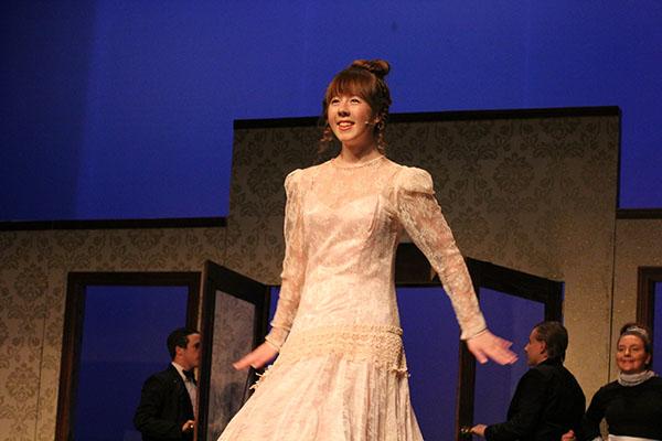 Junior Sara Cook sings "Fancy Dress" through her role as Mrs. Tottendale.