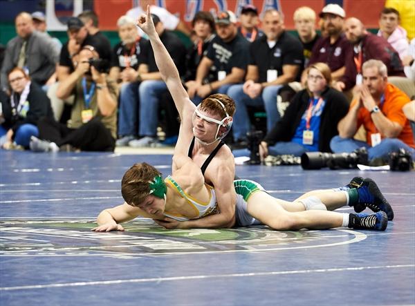 Senior Jeremiah Derby reacts to winning the final match of his high school career at the NCHSAA Championships. Next up for Derby is a tall task -- an exhibition match against his father, David. SUBMITTED PHOTO