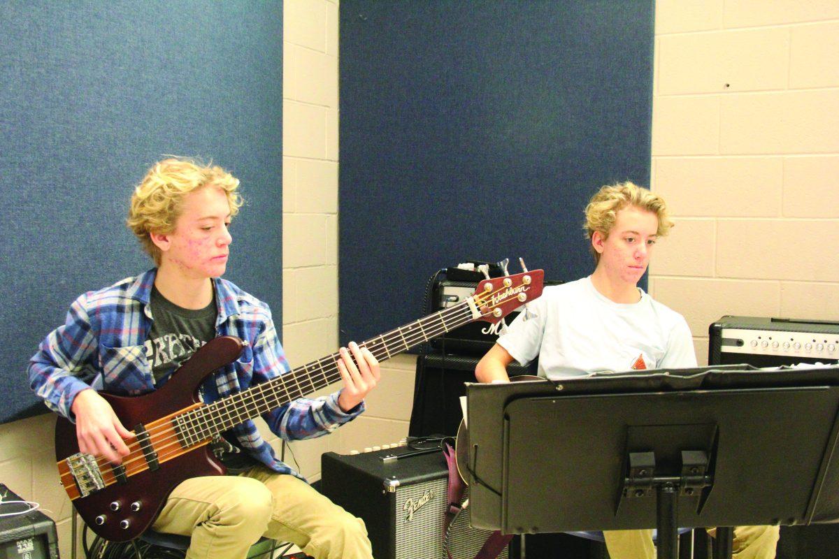 AIS Roberts Twins Play Guitar