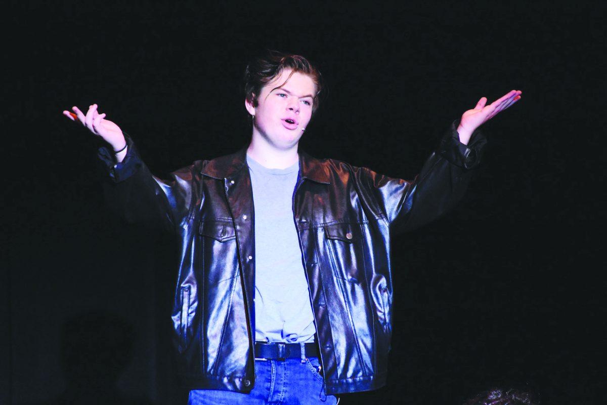 Sophomore Jonathon Davis belts out a final note in his duet 'Mooning,' from StageKraft's last musical production of 'Grease.' Davis first began his theater career at Dockside but has become an integral part of First Flight's StageKraft Productions. PHOTO BY CAITLIN NICHOLSON / Special to Nighthawk News