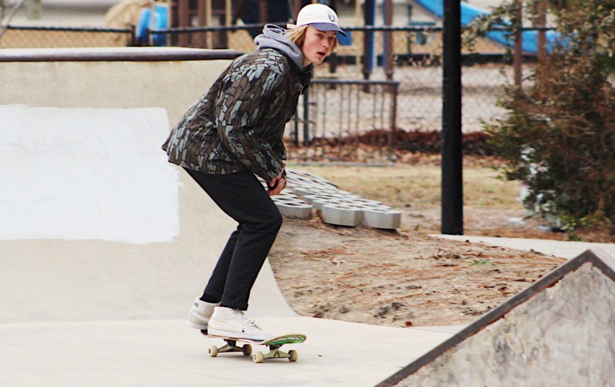 Junior Luke Ash glides across the Kitty Hawk skate park on his board. Ash has skated for most of his life,  but was recently diagnosed with sciatica, meaning he has to put skating on hold. PHOTO BY MICHAELA KELLY / Special to Nighthawk News