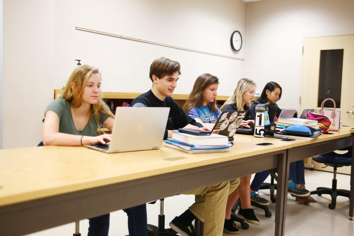 Students work diligently on classes in the online room, where they have the option of taking online courses from College of the Albemarle, NCVPS  and Apex. Photo by Ben Tran/Nighthawk News