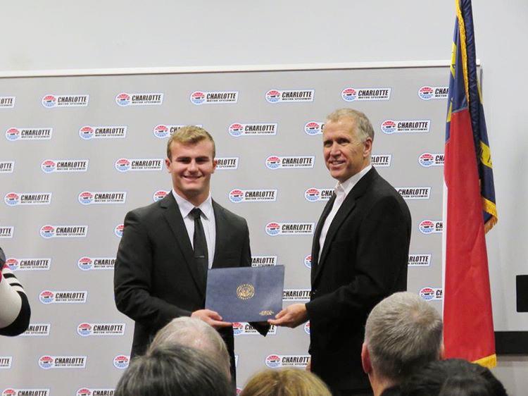 Senior Parker Sylvia receives his nomination from Sen. Thom Tillis as part of his application for the Naval Academy at the Congressional Nomination Ceremony in Charlotte. 