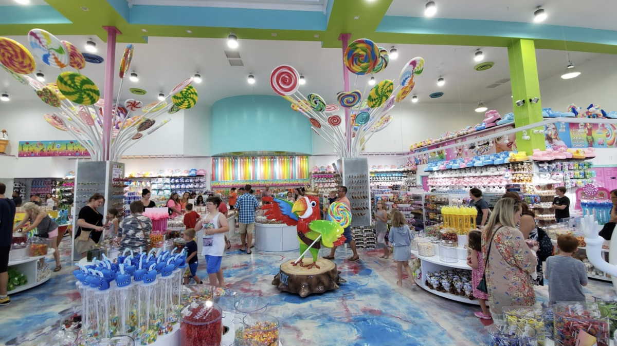 Visitors of the Outer Banks amble around Sugar Kingdom, a new candy store in Kill Devil Hills, looking for a sweet treat.