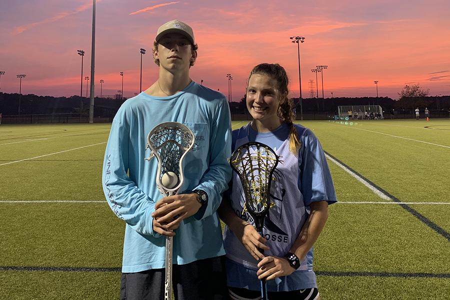 Sophomore Nick Gardill and senior Simone Midgett soak in a perfect sunset after a lacrosse game in Virginia Beach this season. A number of Nighthawks are playing fall ball. PHOTO BY TATUM LOVE/Nighthawk News