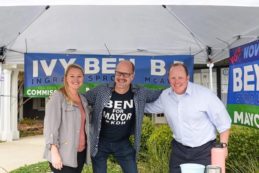 (left to right) Ivy Ingram, Ben Sproul and BJ McAvoy stand together at the Kill Devil Hills Town Hall on election day, greeting voters. Ingram and Sprout have children at FFHS, as does new Nags Head Board of Commissioner Kevin Brinkley. PHOTO BY CYNDI GOETCHEUS SARFAN/Special to Nighthawk News