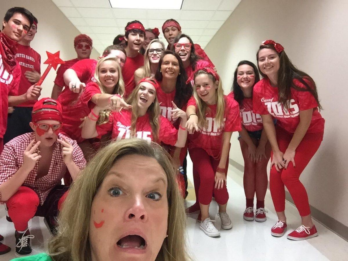 Powell poses for a photo with prior students from the class of 2015. Submitted photo.