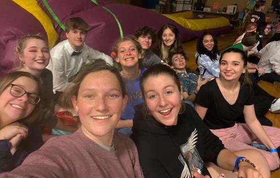 Students from First Flight  High School sit together at the YMCA, taking a break from some of the many events that took place at After Prom on April 2. 