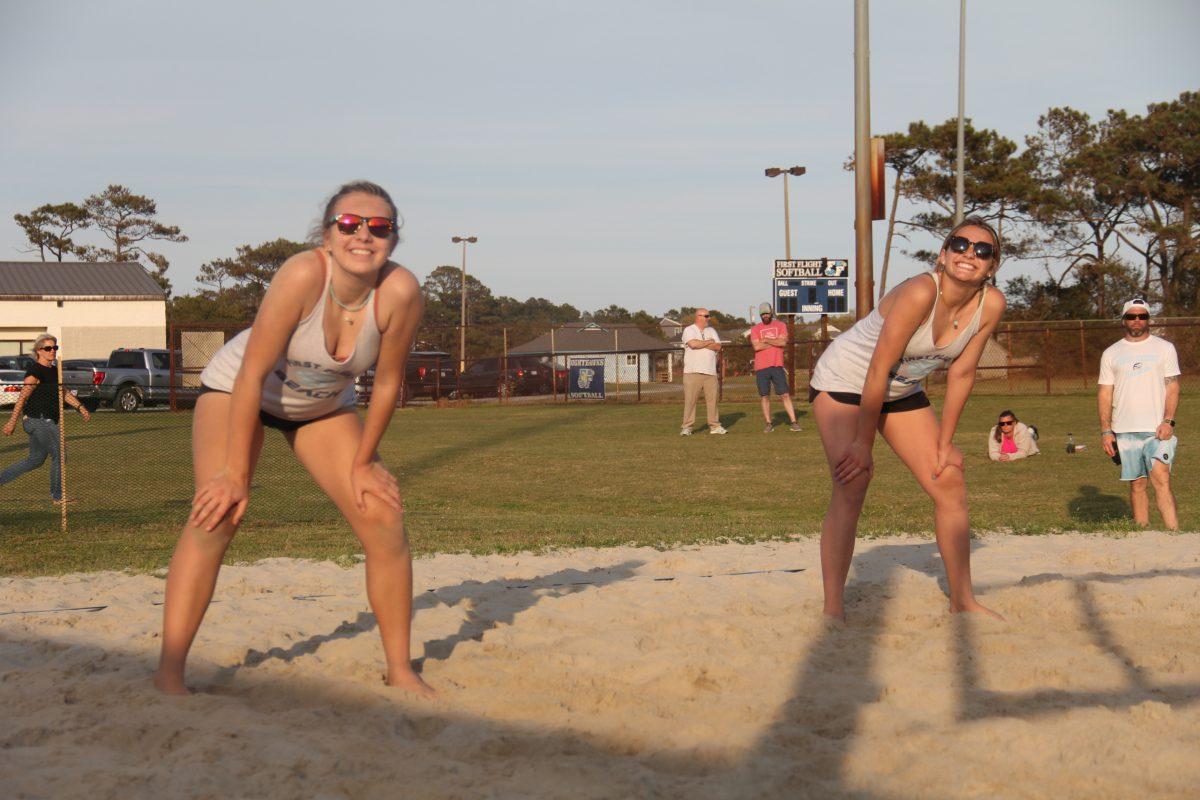 Freshmen Megan Ward (left) and Brooklyn Younts get ready for the start of their first set. PHOTO BY EMMA BRAITHWAITE/Nighthawk News